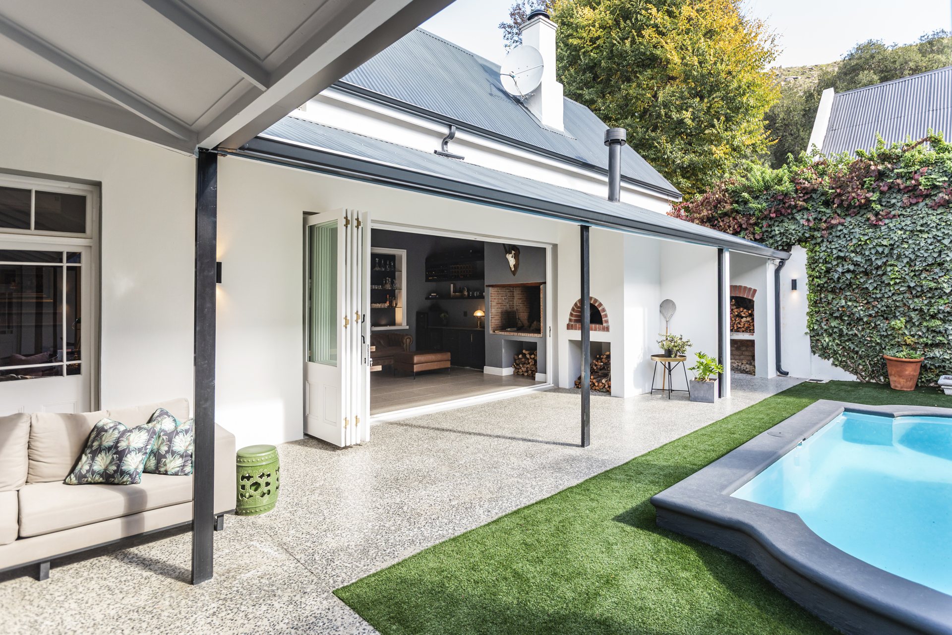 Pool courtyard and glass garden wing at Zion, a Paarl home built by Sterling Master Builders
